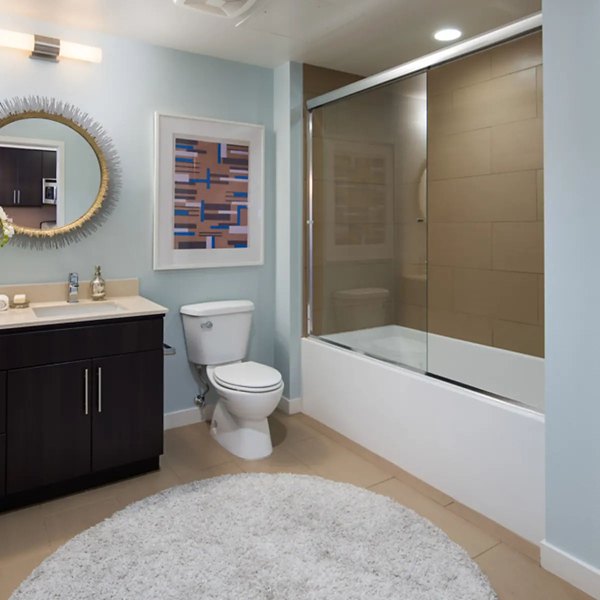Modern bathroom with sleek fixtures and tile design at Stella Apartments