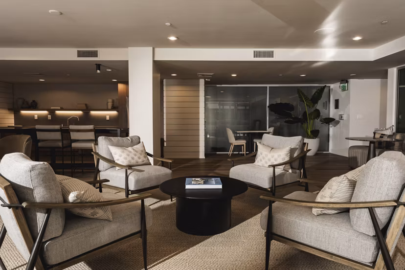 Clubhouse featuring modern design and comfortable seating at Stella Apartments