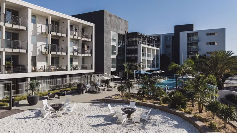Stella Apartments: Lush courtyard with seating and greenery for relaxation