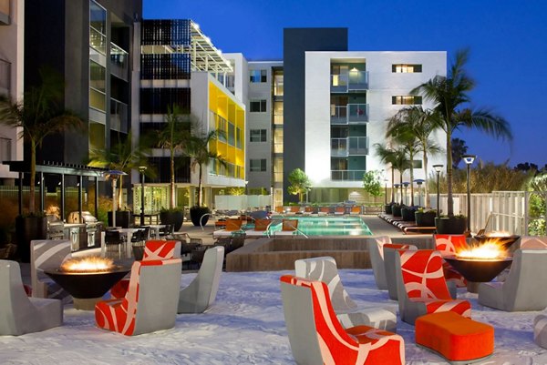 Stella Apartments: Lush courtyard with seating and greenery for relaxation