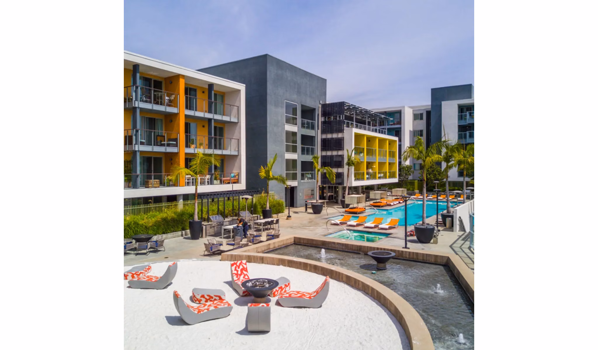 Stella Apartments: Tranquil courtyard with lush greenery and seating areas