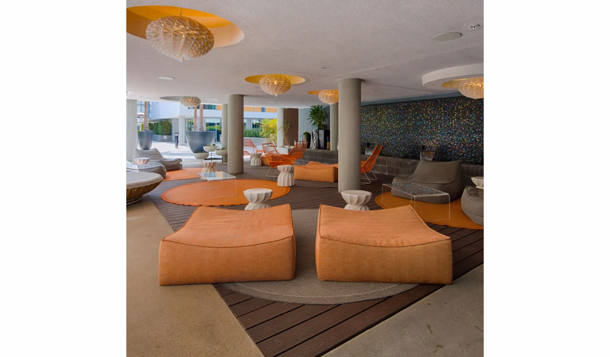 Stella Apartments: Lush courtyard with seating and greenery in a luxury apartment community