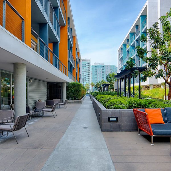 Spacious courtyard with lush gardens at Stella Apartments