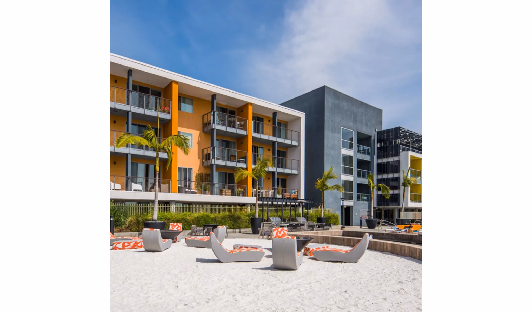 Stella Apartments: Serene courtyard with lush greenery and seating areas offering luxury living