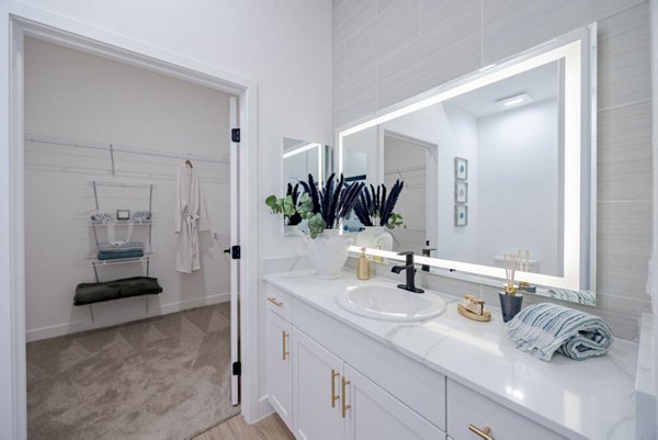 Bathroom featuring sleek fixtures and modern design at Element 12 at Cadence Apartments