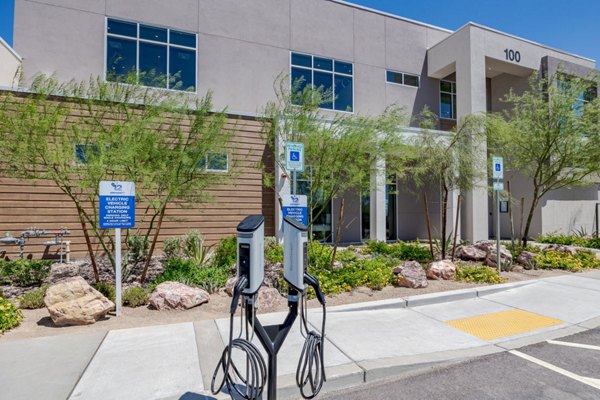 Electric car charging station at Element 12 at Cadence Apartments: Eco-friendly living with modern amenities in luxury Greystar community