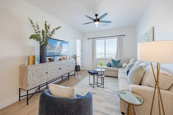 Spacious living room with modern decor at Element 12 at Cadence Apartments