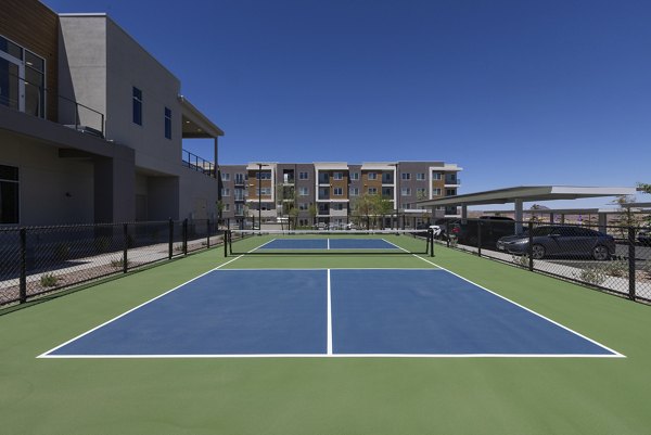 Element 12 at Cadence Apartments: Multi-sport court providing basketball and tennis facilities in a vibrant community setting