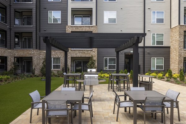 grill area/patio at Liam at Hays Farm Apartments