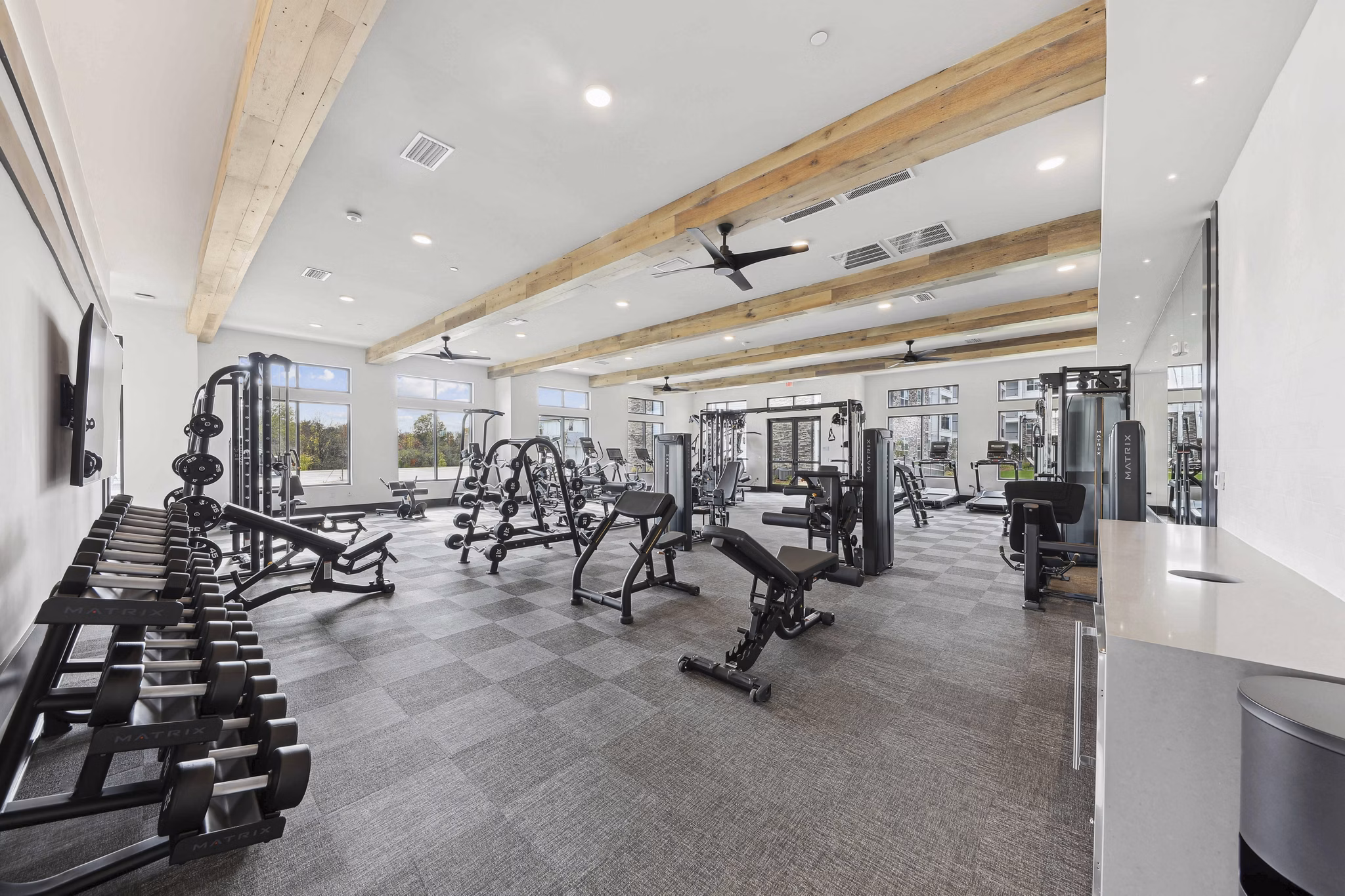 fitness center at The Hudson Apartments 