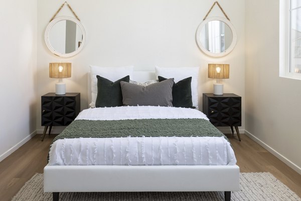 bedroom at The Charlie Perris Apartments