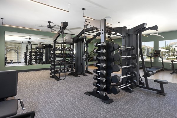 fitness center at The Charlie Perris Apartments