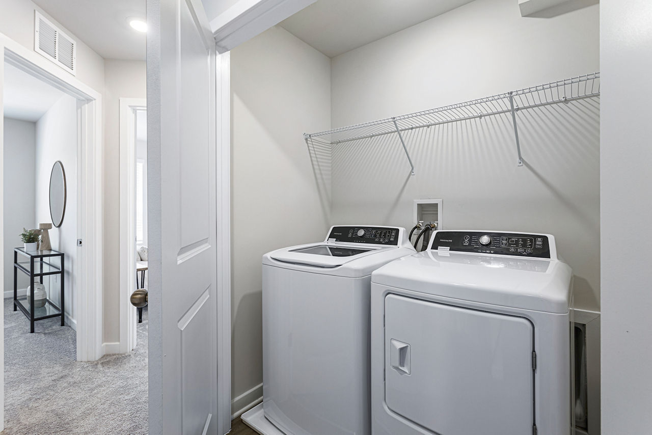 Laundry room at Sunstone Grove