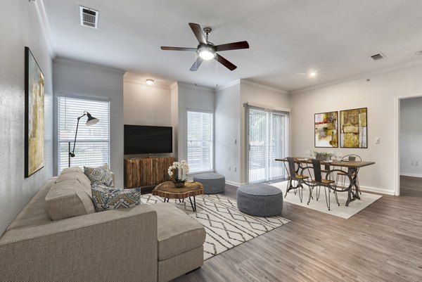 Modern living room with contemporary furniture in The Jax Apartments, luxury residences showcasing stylish interiors and comfort