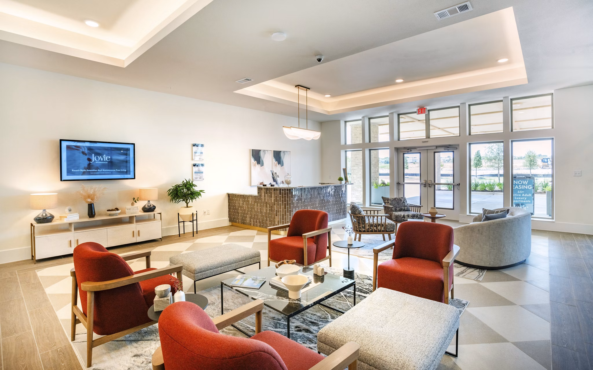 Clubhouse featuring modern design at Jovie Pflugerville Apartments, perfect for gatherings and community events