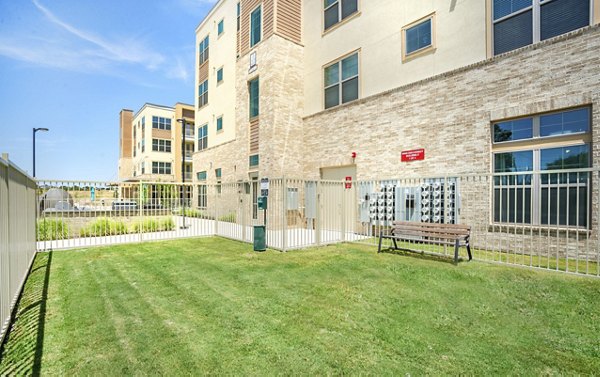 Dog park with agility equipment at Jovie Pflugerville Apartments, offering a fun outdoor space for pets and their owners to enjoy