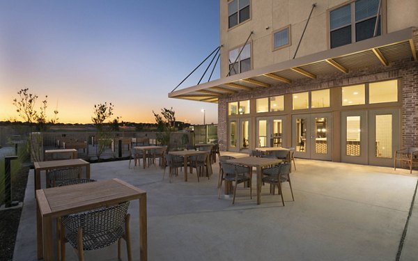 Courtyard with lush landscaping at Jovie Pflugerville Apartments