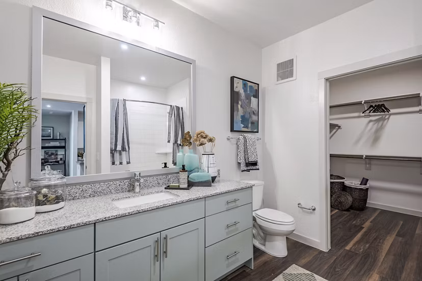 Bathroom featuring modern fixtures and elegant tilework at Prose Greenbriar Apartments