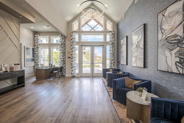 Welcoming clubhouse featuring cozy seating and modern decor at Prose Greenbriar Apartments, perfect for social gatherings and relaxation