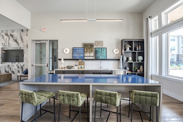 Modern clubhouse with stylish seating in Prose Greenbriar Apartments