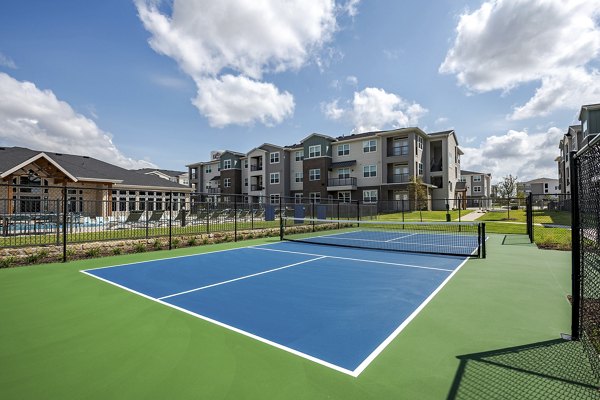 Cozy patio with lounge seating at Prose Greenbriar Apartments, perfect for outdoor relaxation