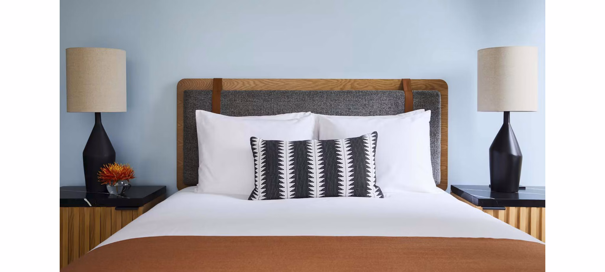 Cozy bedroom with stylish decor at CHROMA Apartments