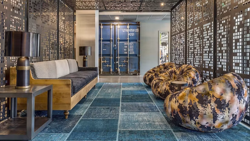 Contemporary clubhouse with modern design at CHROMA Apartments, ideal for social gatherings and relaxation