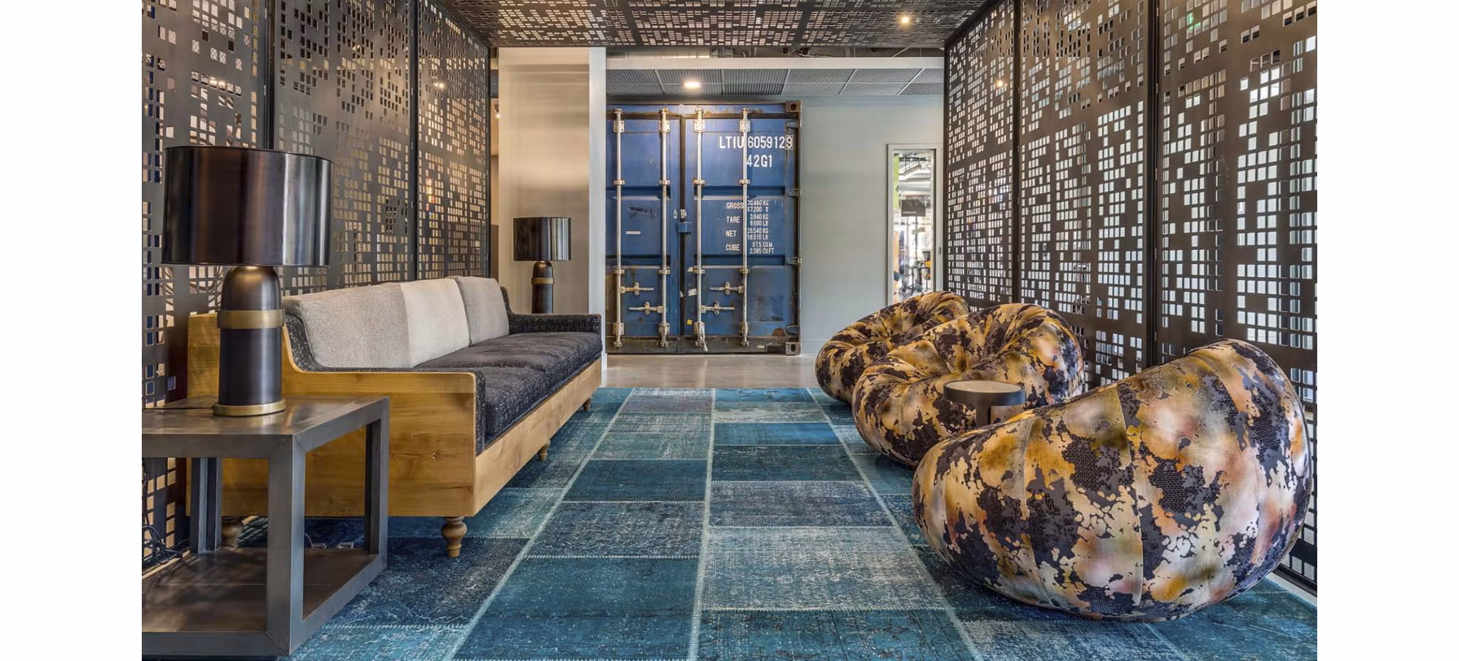 Contemporary clubhouse with modern design at CHROMA Apartments, ideal for social gatherings and relaxation
