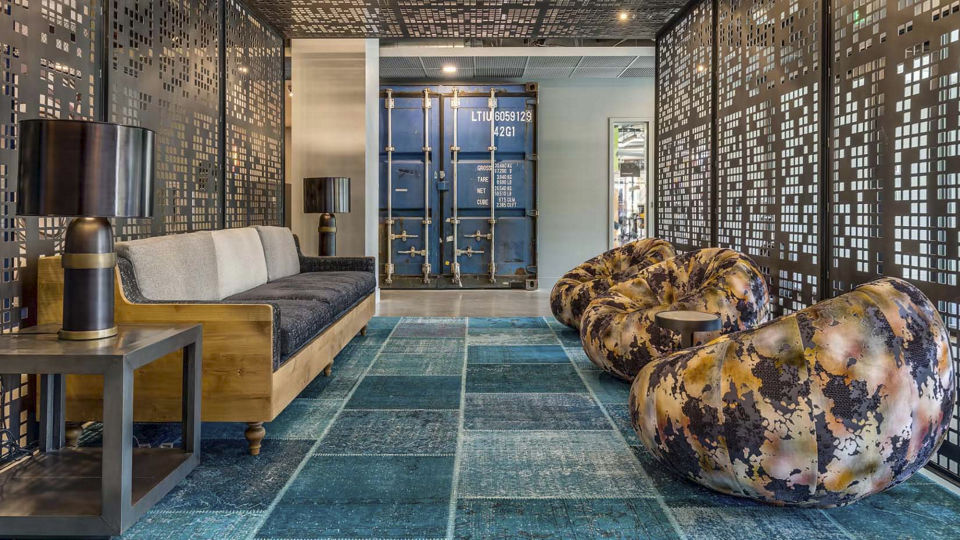 Contemporary clubhouse with modern design at CHROMA Apartments, ideal for social gatherings and relaxation