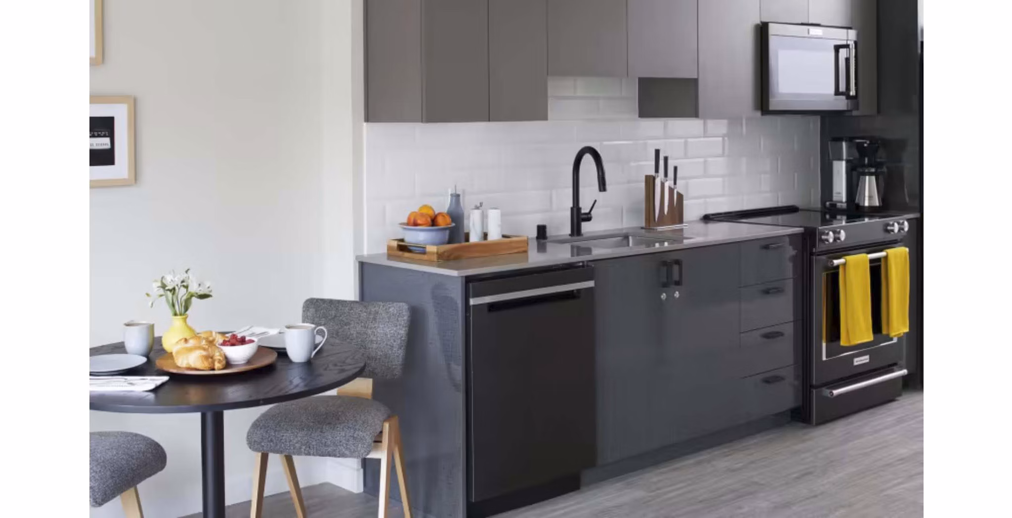 Elegant dining area with modern furnishings in CHROMA Apartments