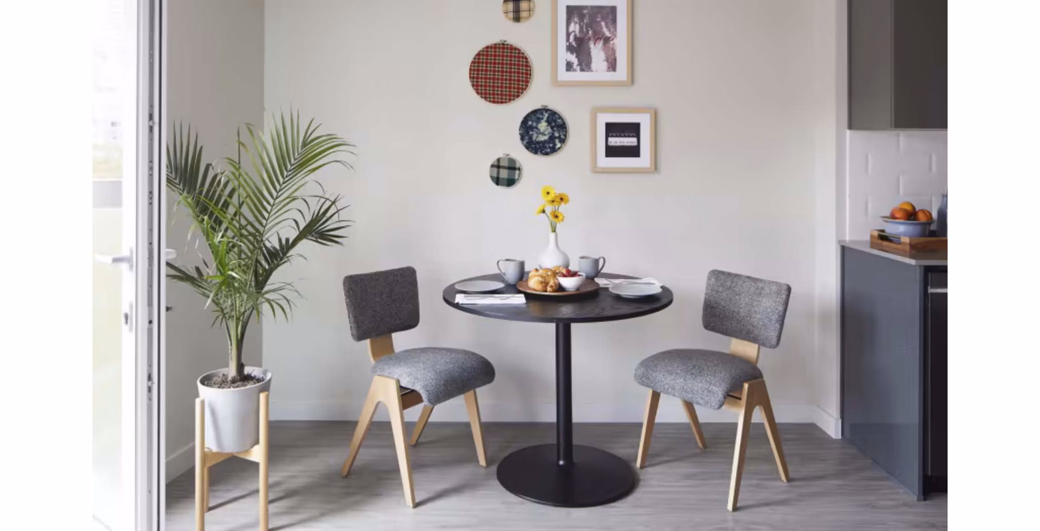 Modern dining area with elegant decor at CHROMA Apartments, perfect for stylish living in a luxury apartment community