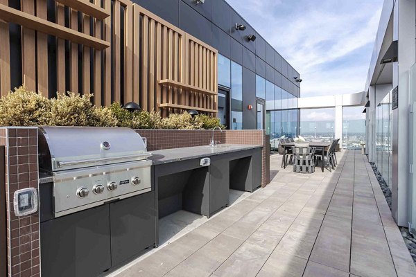 grill area/patio at Flora Apartments