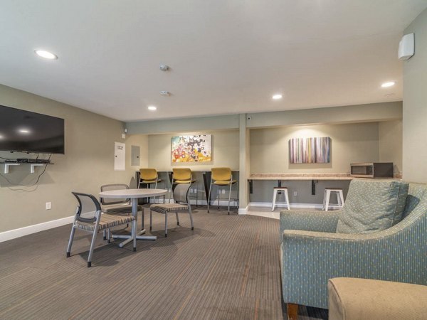 Modern clubhouse with stylish seating and natural light at Citrus Court Apartments, a luxurious Greystar property