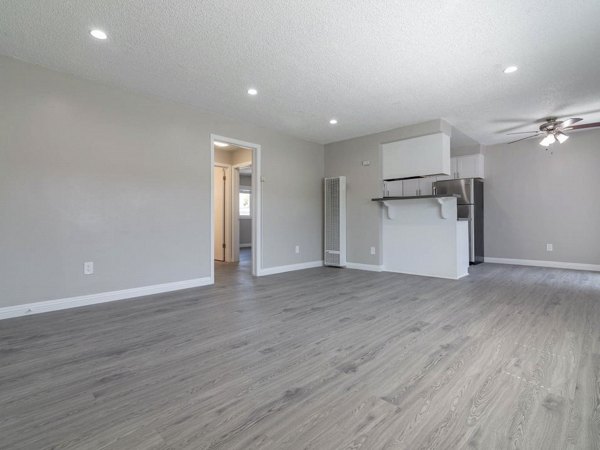 Modern living room with stylish furniture at Citrus Court Apartments, featuring spacious layout and natural light