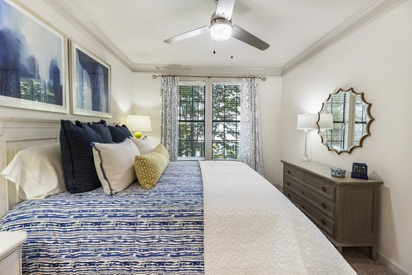 Modern bedroom with elegant decor at Gramercy at Buckhead Apartments in Atlanta