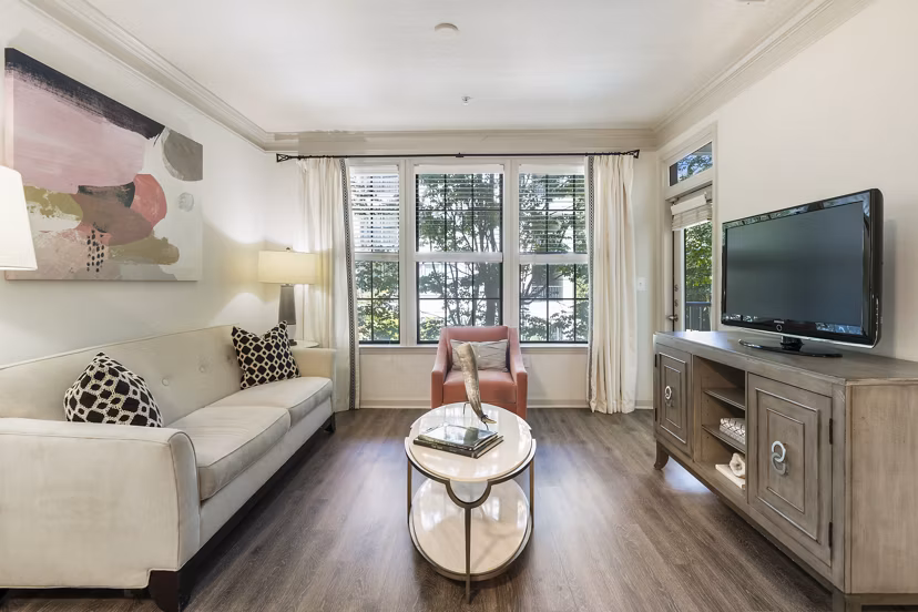 Spacious living room with modern decor at Gramercy at Buckhead Apartments, ideal for luxury living in the heart of Atlanta's Buckhead neighborhood