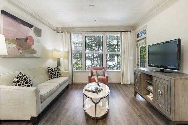 Spacious living room with modern decor at Gramercy at Buckhead Apartments, ideal for luxury living in the heart of Atlanta's Buckhead neighborhood