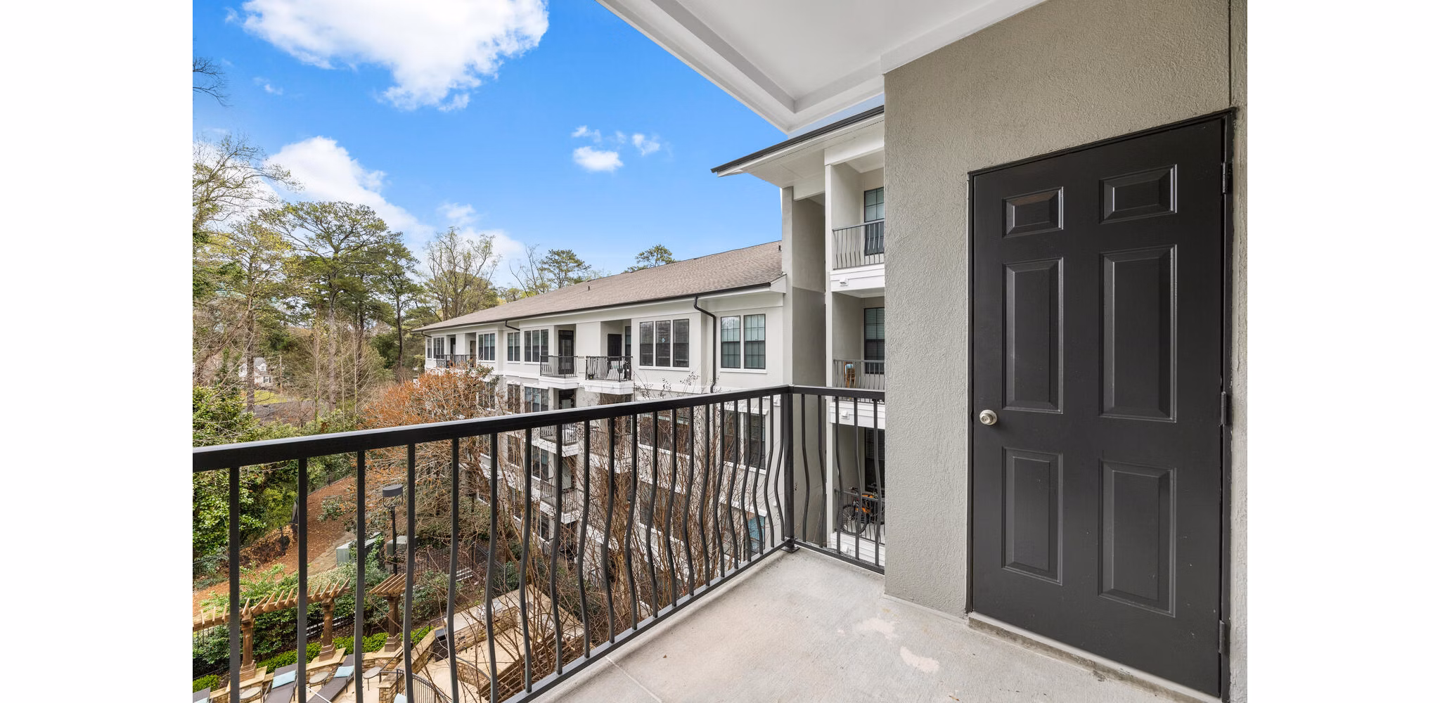 Private balcony with city views at Gramercy at Buckhead Apartments, offering luxury living in Atlanta's vibrant Buckhead neighborhood