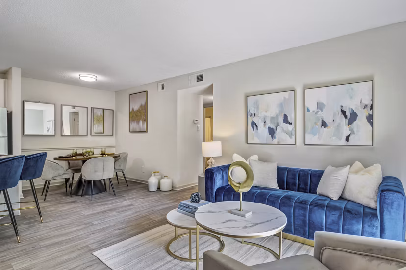 Modern living room with chic furnishings and natural light at Morgan Place Apartments luxury living