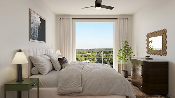 Bedroom featuring modern decor and queen-size bed at The Bouldin Apartments, Greystar luxury apartments in vibrant neighborhood