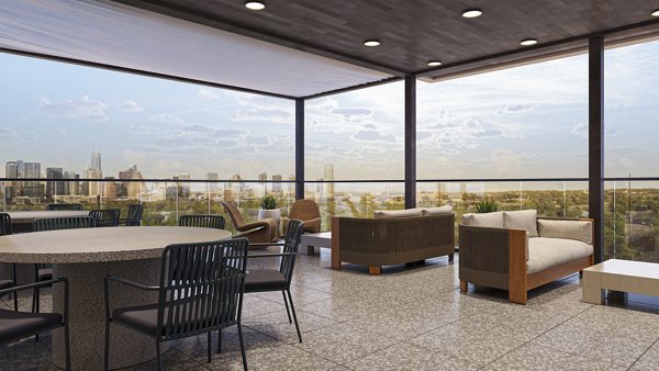 Clubhouse featuring contemporary design and spacious lounge area at The Bouldin Apartments