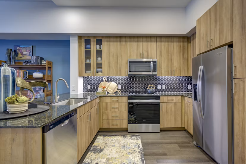 kitchen at Alexan Rivercrest Apartments 