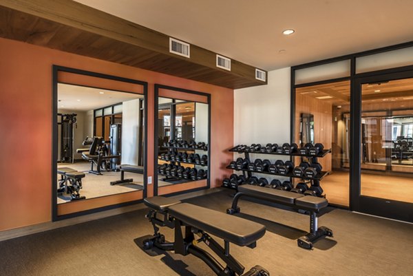 fitness center at The Russell Apartments