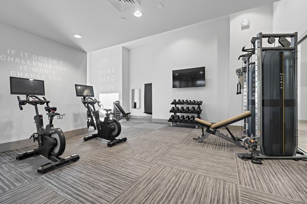 outdoor fitness center area at Bask Deer Valley Apartments