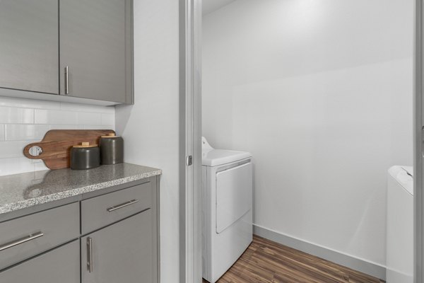 laundry room at Bask Deer Valley Apartments