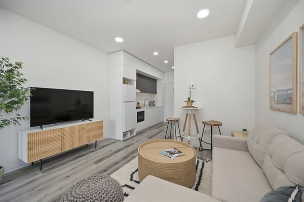 Clubhouse with modern design and comfortable seating at 3167 Market Apartments, a luxury living space