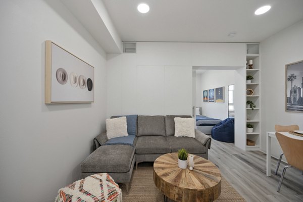 Clubhouse featuring modern design and cozy seating at 3167 Market Apartments, perfect for relaxation and socializing