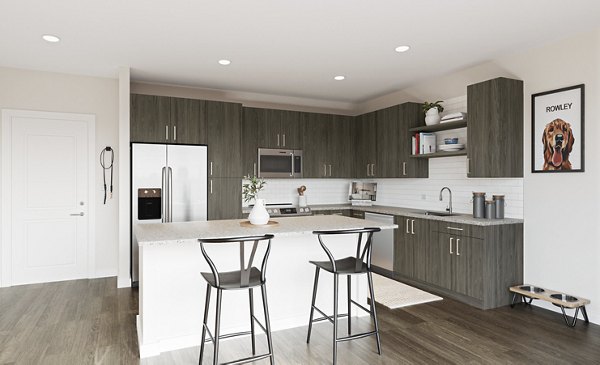 Modern kitchen featuring stainless steel appliances at Allora Southview Apartments