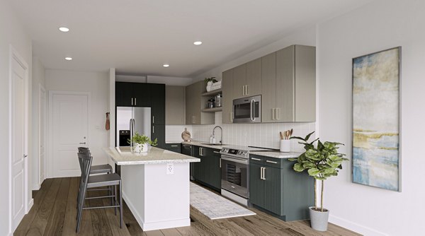 Modern kitchen with stainless steel appliances in Allora Southview Apartments