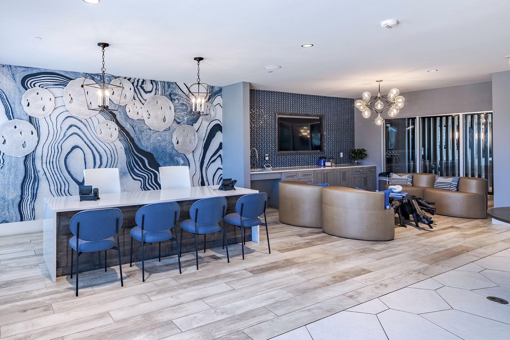 The District Clubhouse: Modern clubhouse with recreational spaces at Little Elm Apartments